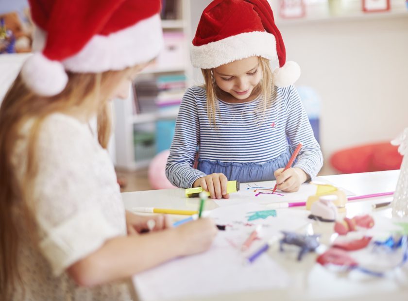 Children drawing some christmas paintings